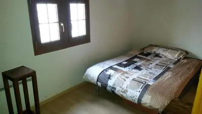 Ein Bett oder Betten in einem Zimmer der Unterkunft Chalet Edelweiss