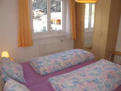 Ein Bett oder Betten in einem Zimmer der Unterkunft Aurora Appartement WEISSMIES by FeWo-PLAN SAAS232