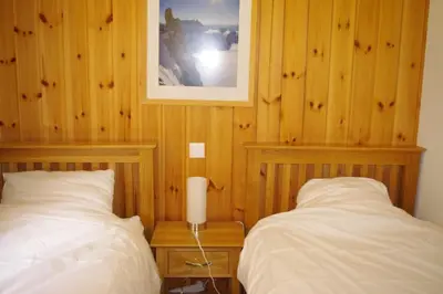 Ein Bett oder Betten in einem Zimmer der Unterkunft Chalet Mille Étoiles