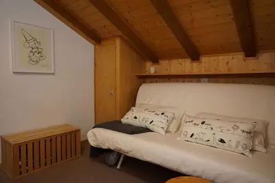 Ein Bett oder Betten in einem Zimmer der Unterkunft Vue à couper le souffle Arellaz 42