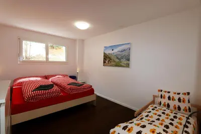 Ein Bett oder Betten in einem Zimmer der Unterkunft Perrine 1: Modern 3-room apartment