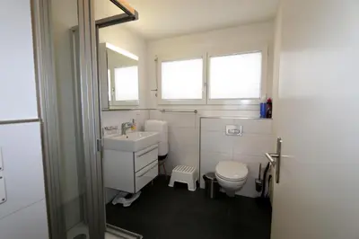 Ein Badezimmer in der Unterkunft Perrine 1: Modern 3-room apartment