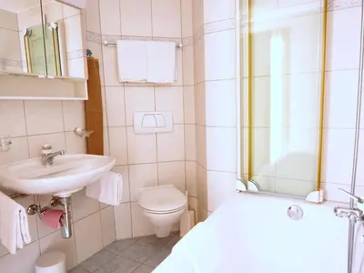 Ein Badezimmer in der Unterkunft Apartment Bergfreude 06 by Interhome