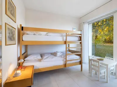 Ein Bett oder Betten in einem Zimmer der Unterkunft Apartment Marigny Dent-Blanche 9-8 by Interhome