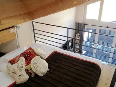 Ein Bett oder Betten in einem Zimmer der Unterkunft Casa delle Stelle by Zermatt Premium Apartments