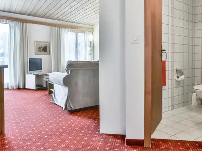 Ein Badezimmer in der Unterkunft Apartment Chalet Abendrot apARTments-14 by Interhome