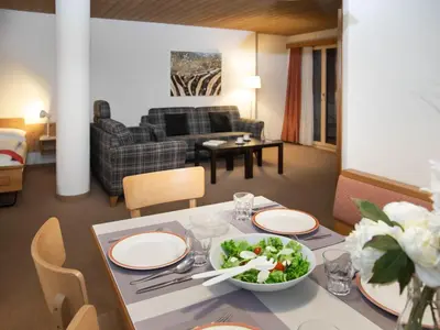 Ein Sitzbereich in der Unterkunft Apartment Chalet Abendrot apARTments-17 by Interhome
