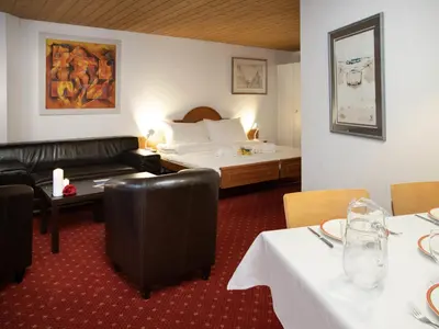 Ein Bett oder Betten in einem Zimmer der Unterkunft Apartment Chalet Abendrot apARTments-18 by Interhome