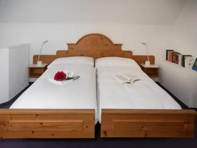 Ein Bett oder Betten in einem Zimmer der Unterkunft Apartment Chalet Abendrot apARTments-20 by Interhome