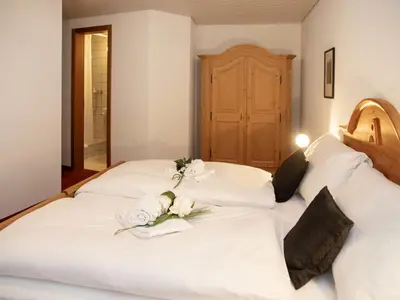 Ein Bett oder Betten in einem Zimmer der Unterkunft Apartment Chalet Abendrot apARTments-29 by Interhome