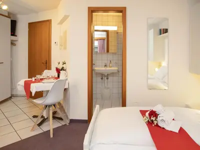 Ein Bett oder Betten in einem Zimmer der Unterkunft Apartment Chalet Abendrot apARTments-5 by Interhome