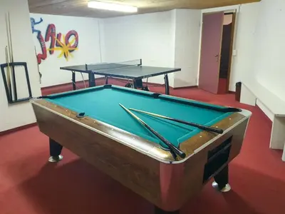 Ein Billardtisch in der Unterkunft Apartment Chalet Abendrot apARTments-7 by Interhome