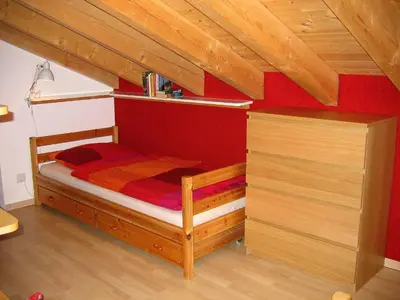 Ein Bett oder Betten in einem Zimmer der Unterkunft Apartment Gentiana - Utoring-42 by Interhome