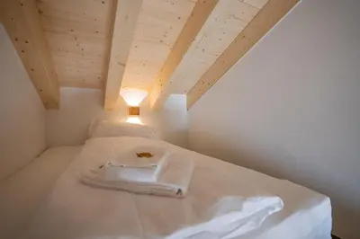 Ein Bett oder Betten in einem Zimmer der Unterkunft Vieux Valais BeeValais 1