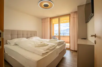 Ein Bett oder Betten in einem Zimmer der Unterkunft Vieux Valais BeeValais 2