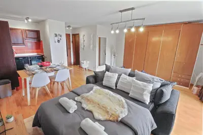 Ein Sitzbereich in der Unterkunft Joli appartement au centre