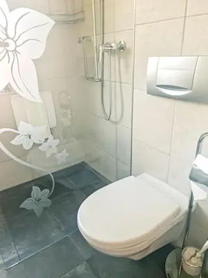 Ein Badezimmer in der Unterkunft Alpenglück Apartment - Aare Jungfrau AG