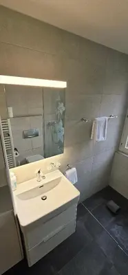 Ein Badezimmer in der Unterkunft Alpenglück Apartment - Aare Jungfrau AG