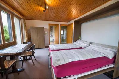 Ein Bett oder Betten in einem Zimmer der Unterkunft The Nadelgrat