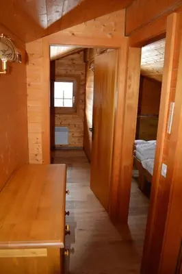 Ein Bett oder Betten in einem Zimmer der Unterkunft Magnifique chalet d'époque