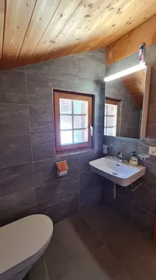 Ein Badezimmer in der Unterkunft Magnifique chalet d'époque