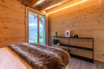 Ein Bett oder Betten in einem Zimmer der Unterkunft Base Camp COSY chalet 4 personnes