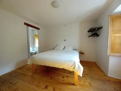 Ein Bett oder Betten in einem Zimmer der Unterkunft Casa Coerente Cavergno - Room 2