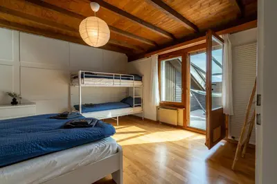 Ein Bett oder Betten in einem Zimmer der Unterkunft Jungfrau-View Apartment, terrace & free parking