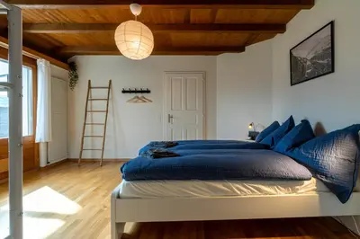 Ein Bett oder Betten in einem Zimmer der Unterkunft Jungfrau-View Apartment, terrace & free parking
