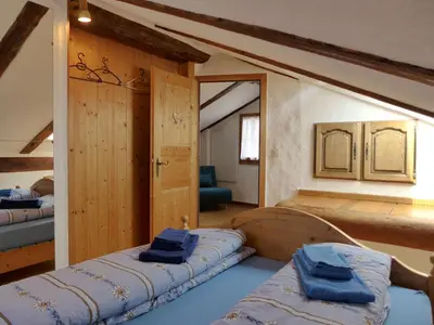 Ein Bett oder Betten in einem Zimmer der Unterkunft Chalet Tschingeli by Interhome