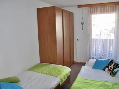 Ein Bett oder Betten in einem Zimmer der Unterkunft Apartment Aster by Interhome