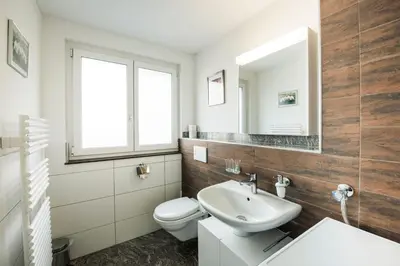 Ein Badezimmer in der Unterkunft Alpenblick - Direct lake view