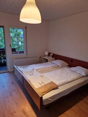 Ein Bett oder Betten in einem Zimmer der Unterkunft Hotel Chalet Bellerive