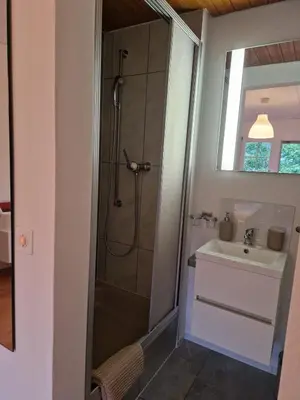 Ein Badezimmer in der Unterkunft Hotel Chalet Bellerive