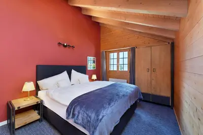 Ein Bett oder Betten in einem Zimmer der Unterkunft Chalet Eigersunna