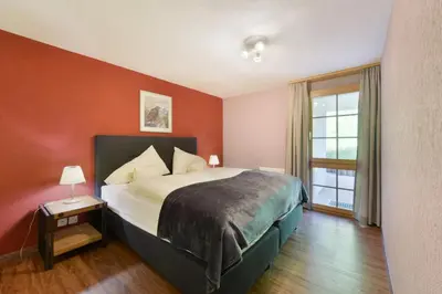 Ein Bett oder Betten in einem Zimmer der Unterkunft Chalet Eigersunna