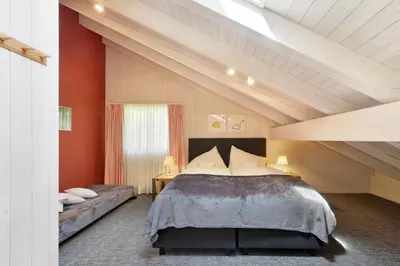 Ein Bett oder Betten in einem Zimmer der Unterkunft Chalet Eigersunna