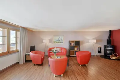 Ein Sitzbereich in der Unterkunft Chalet Eigersunna