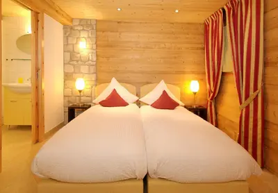 Ein Bett oder Betten in einem Zimmer der Unterkunft Ferienapartement Hinterdorf
