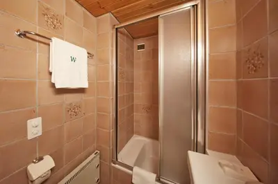 Ein Badezimmer in der Unterkunft Hotel Waldhaus
