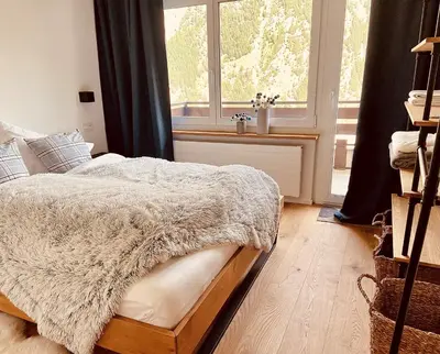 Ein Bett oder Betten in einem Zimmer der Unterkunft Appartment Alpenrose