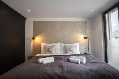 Ein Bett oder Betten in einem Zimmer der Unterkunft Denali Apartment by HomeFlow