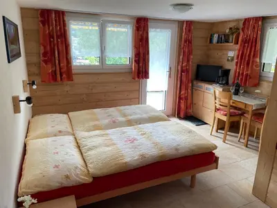 Ein Bett oder Betten in einem Zimmer der Unterkunft Chalet Kolibri
