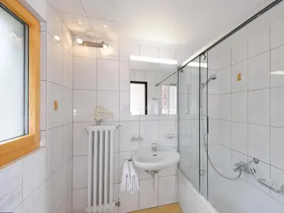 Ein Badezimmer in der Unterkunft Hotel Alphubel