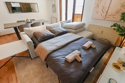 Ein Bett oder Betten in einem Zimmer der Unterkunft Logement chaleureux au coeur de la station