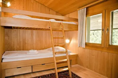 Ein Bett oder Betten in einem Zimmer der Unterkunft Chalet Adele