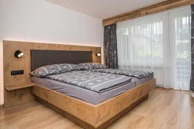 Ein Bett oder Betten in einem Zimmer der Unterkunft Haus Floralp