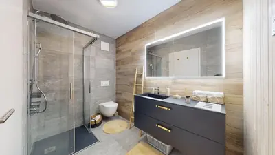 Ein Badezimmer in der Unterkunft Apartment with sauna and mountain view