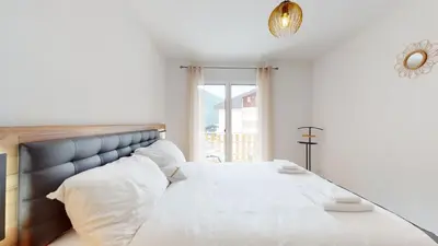 Ein Bett oder Betten in einem Zimmer der Unterkunft Apartment with sauna and mountain view