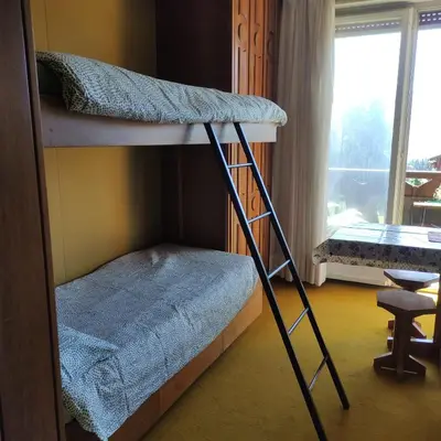 Ein Bett oder Betten in einem Zimmer der Unterkunft Bellevue Crans-Montana